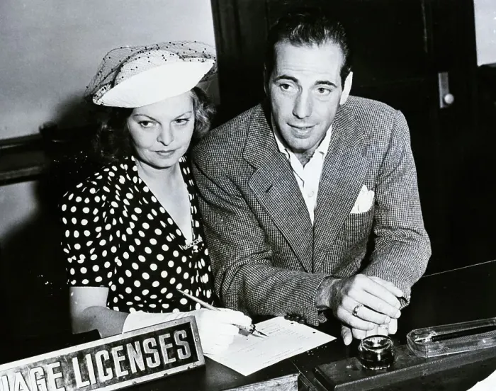 Framed Print : Humphrey Bogart &Mayo Methot Applying