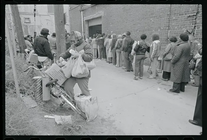 Framed Print : Hundreds Wait for Free Food in Detroit Framed Print : Hundreds Wait for Free Food in Detroit