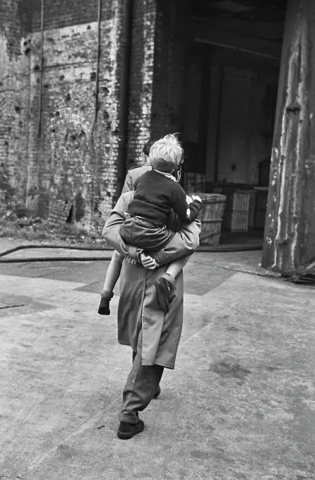 Framed Print : Hunted. English actor, Dirk Bogarde carries Scottish child actor Framed Print : Hunted. English actor, Dirk Bogarde carries Scottish child actor