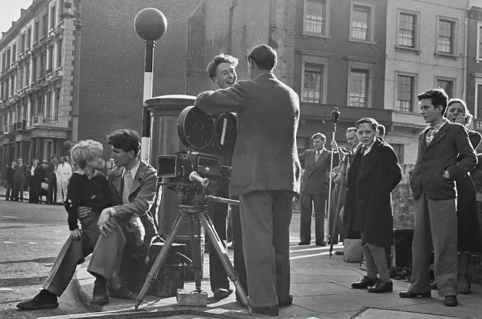 Framed Print : Hunted. Scottish child actor Jon Whiteley sits on the knee of a man during Framed Print : Hunted. Scottish child actor Jon Whiteley sits on the knee of a man during