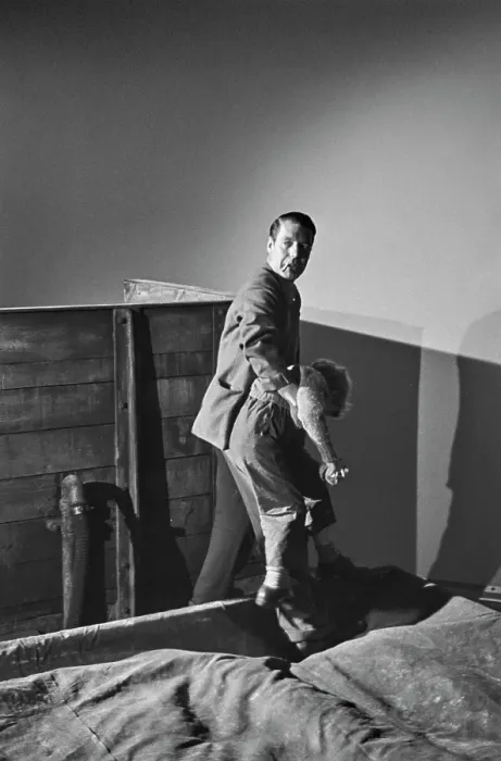 Framed Print : Hunted. English film director Charles Crichton carries Scottish child actor Framed Print : Hunted. English film director Charles Crichton carries Scottish child actor