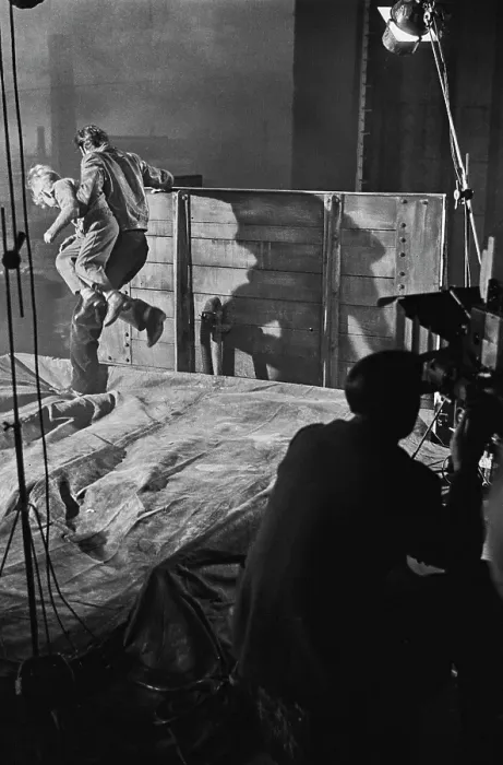 Framed Print : Hunted. Scottish child actor Jon Whiteley is carried by a man on set during Framed Print : Hunted. Scottish child actor Jon Whiteley is carried by a man on set during