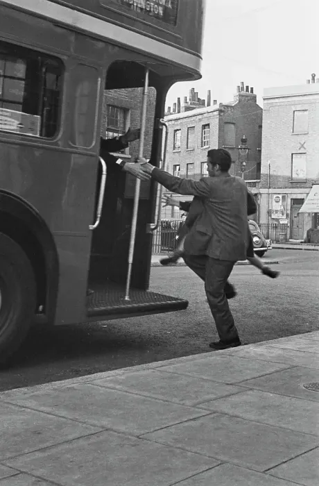 Framed Print : Hunted. Scottish child actor Jon Whiteley is carried onto a bus during Framed Print : Hunted. Scottish child actor Jon Whiteley is carried onto a bus during