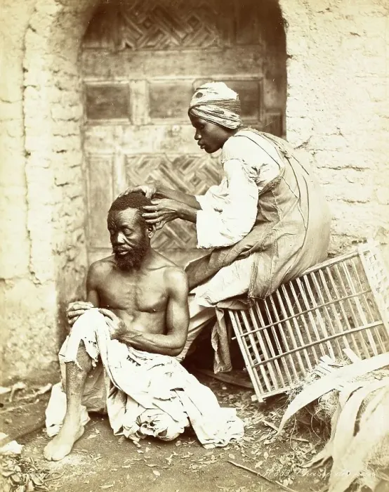 Framed Print : Hunting for Fleas, Man examining the hair of another for fleas and vermin, c. 1870, India, Historic, digitally restored reproduction from an original of the period