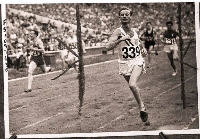 Framed Print : Hurdler Roy Cochran Crossing Finish Line in Olympics Framed Print : Hurdler Roy Cochran Crossing Finish Line in Olympics