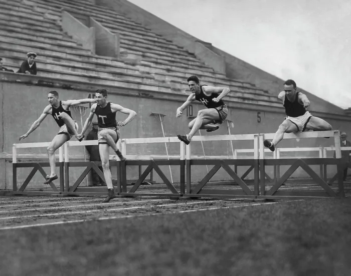 Framed Print : Hurdling. Four athletes compete in a hurdles event, circa 1925 Framed Print : Hurdling. Four athletes compete in a hurdles event, circa 1925