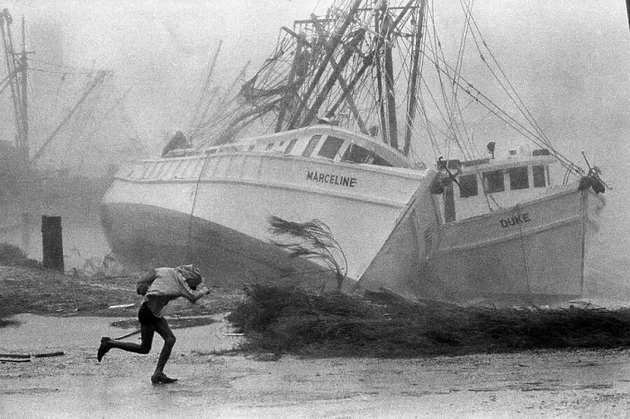 Framed Print : Hurricane Wind Toppeling Shrimp Boats