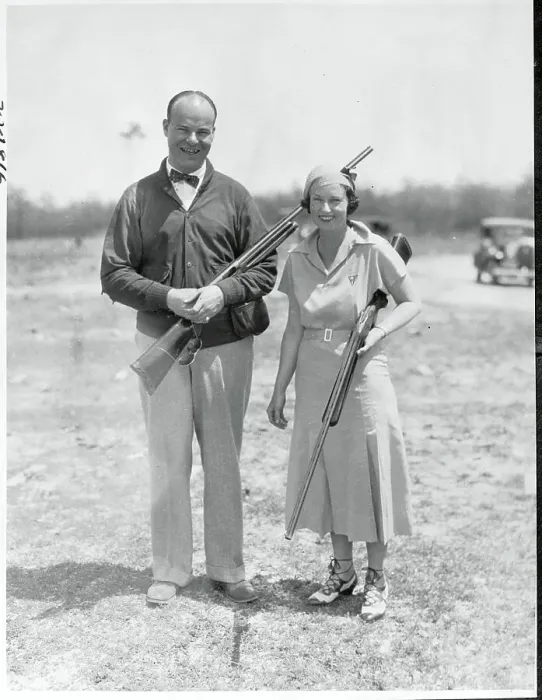 Framed Print : Husband and Wife Holding Rifles Framed Print : Husband and Wife Holding Rifles