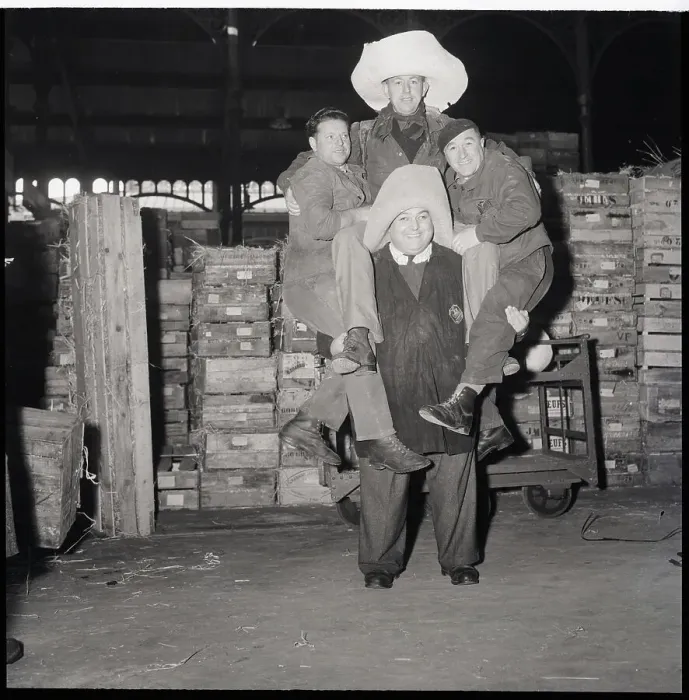 Framed Print : Husky Strongman In Hat Lifting Three Men Framed Print : Husky Strongman In Hat Lifting Three Men