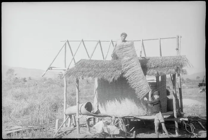 Framed Print : Hut Being Repaired by Villagers Framed Print : Hut Being Repaired by Villagers
