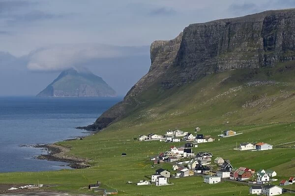 The Hvalba settlement, Hvalbiarfjorour, the uninhabited island of Litla Dimun at the back, Suouroy, Faroe Islands, Denmark