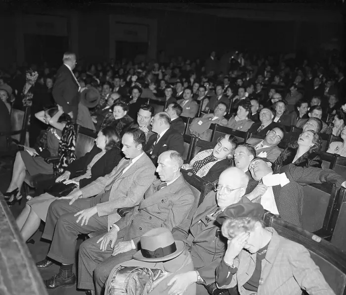 Framed Print : Hypnotist Examines Entranced Audience Framed Print : Hypnotist Examines Entranced Audience