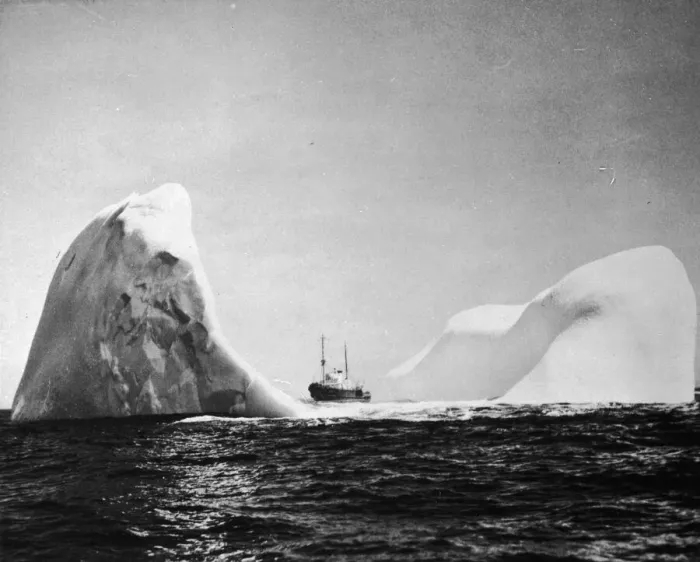 Framed Print : Ice Giant. circa 1950: US Coast Guard cutter Acushnet dwarfed by a crescent Framed Print : Ice Giant. circa 1950: US Coast Guard cutter Acushnet dwarfed by a crescent