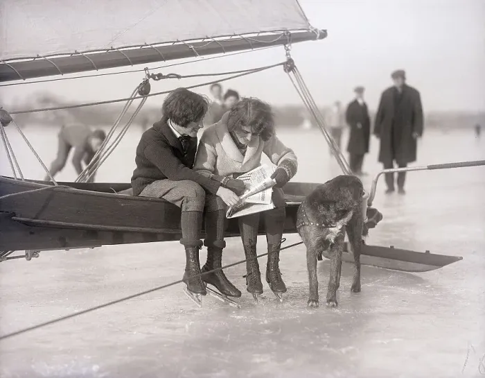 Framed Print : Ice Skaters Doing A Crossword Puzzle