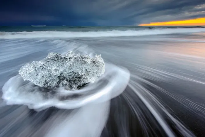 Framed Print : Iceberg on a beach