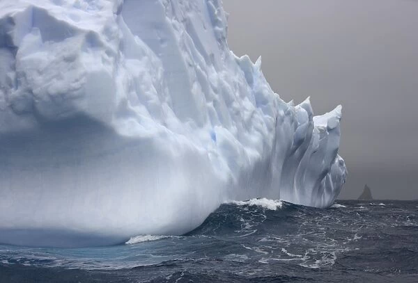 Iceberg and sea waves, South Georgia Island