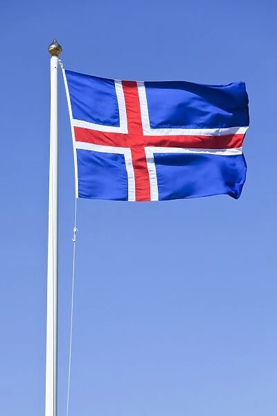 Icelandic national flag blowing in the wind, Iceland, Europe