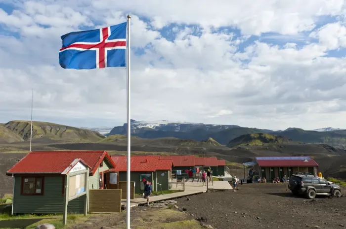 Framed Print : Icelandic National Flag, Emstrur - Botnar Hut at the Laugavegur hiking trail, Rangarping ytra, Iceland, Scandinavia