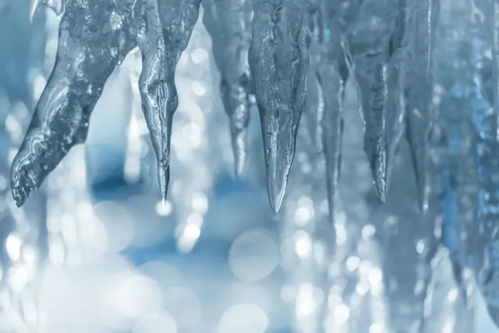 Framed Print : Icicle with booked background Framed Print : Icicle with booked background