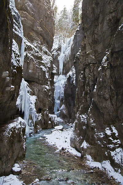 Icy gorge with a mountain stream and steep rock walls, Partnach Gorge, near Garmisch-Partenkirchen, Upper Bavaria, Bavaria, Germany