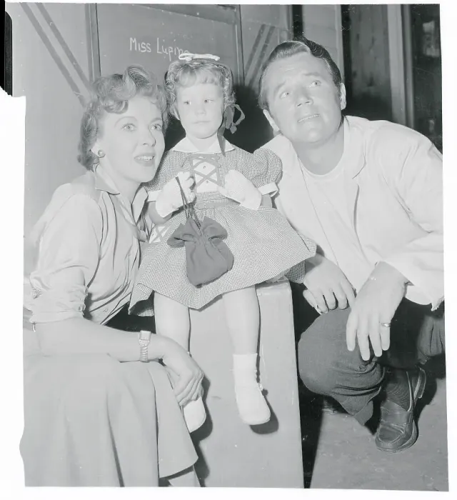 Framed Print : Ida Lupino and Howard Duff Holding Child Framed Print : Ida Lupino and Howard Duff Holding Child