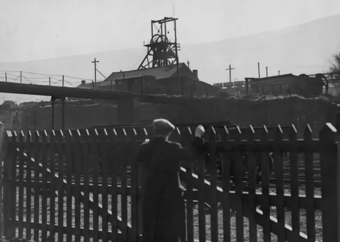 Framed Print : Idle Pit. A man looks over a fence to the deserted Gorki pit near Mountain Ash Framed Print : Idle Pit. A man looks over a fence to the deserted Gorki pit near Mountain Ash