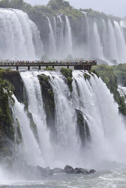 Iguazu Waterfalls and footbridge for tourists, Brazil  /  Argentina