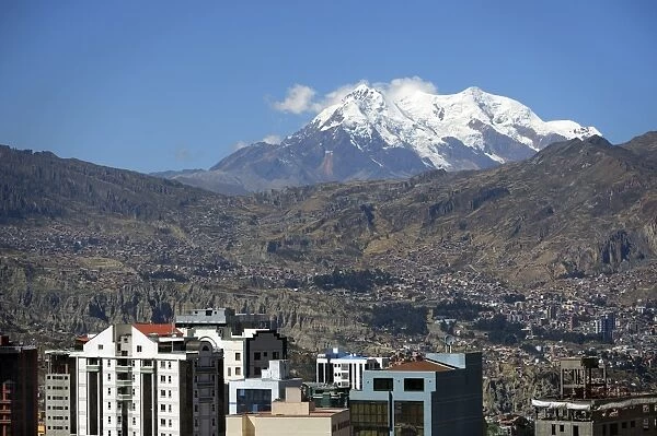 Illimani Glacier, 6, 439 m, at front the skyscrapers of La Paz, Departamento La Paz, Bolivia