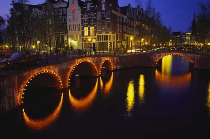 Framed Print : Illuminated Bridges Reflected in the Canals at Night, Keizersgracht, Amsterdam Framed Print : Illuminated Bridges Reflected in the Canals at Night, Keizersgracht, Amsterdam
