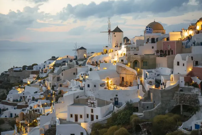 Framed Print : Illuminated Oia village at dusk, Santorini, Greece Framed Print : Illuminated Oia village at dusk, Santorini, Greece