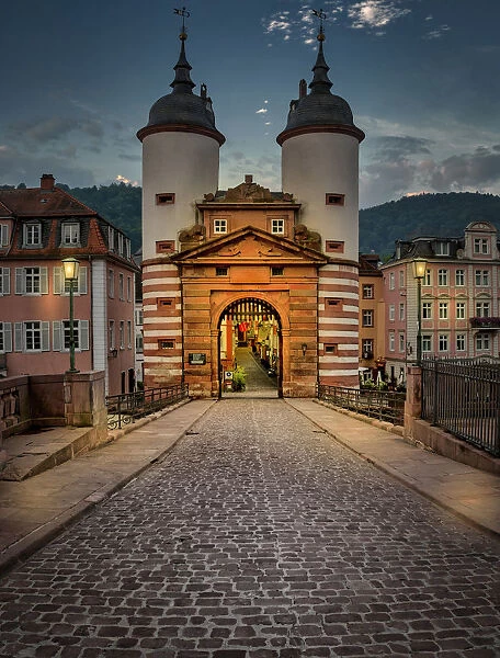 Illuminated Old Bridge Gate at Karl Theodor Bridge in Heidelberg, Baden-Wurttemberg