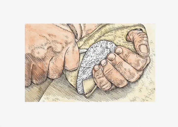 Framed Print : Illustration of man using tip of antler to shape stone, and pad of leather to protect palm of hand Framed Print : Illustration of man using tip of antler to shape stone, and pad of leather to protect palm of hand