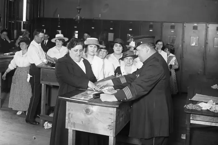 Framed Print : Immigrant Women Being Fingerprinted Framed Print : Immigrant Women Being Fingerprinted
