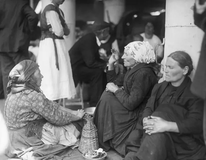 Framed Print : Immigrant Women Seated on Floor Framed Print : Immigrant Women Seated on Floor