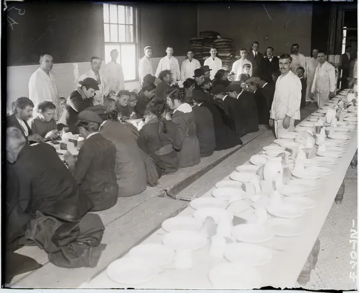 Framed Print : Immigrants Being Served Dinner Framed Print : Immigrants Being Served Dinner
