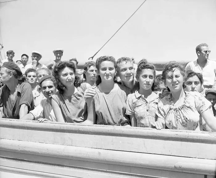 Framed Print : Immigrants Stand at Ship Railing Framed Print : Immigrants Stand at Ship Railing