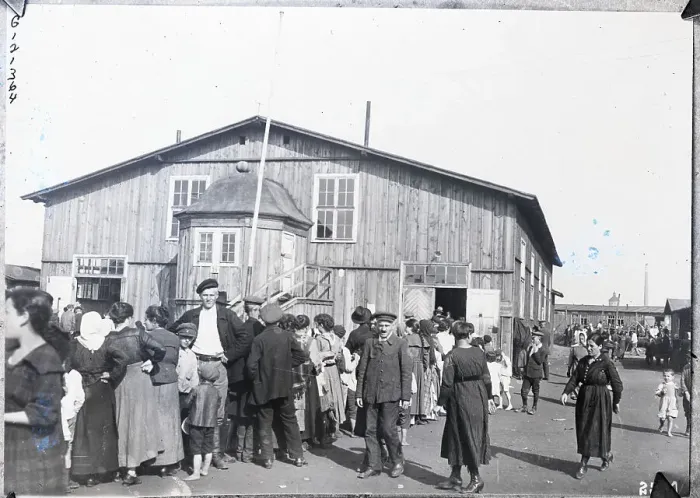Framed Print : Immigration Refugees Wait For Dinner