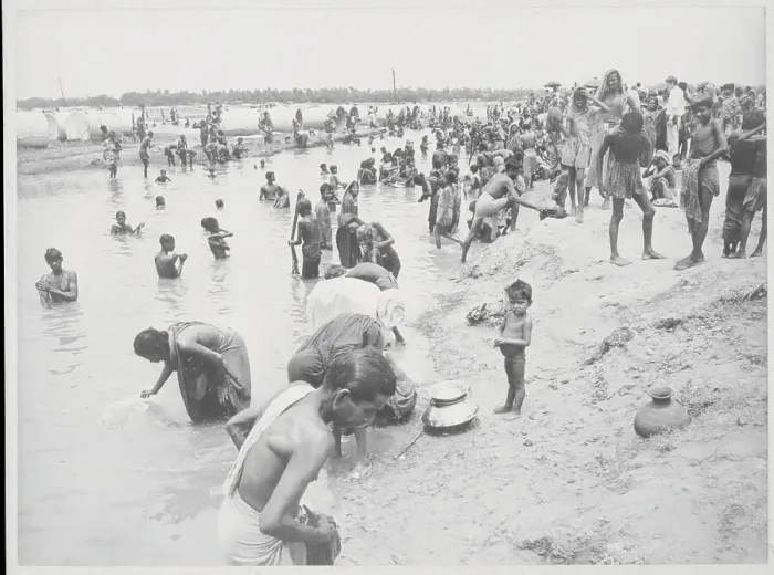 Framed Print : India Refugees Bathing at Pond Framed Print : India Refugees Bathing at Pond