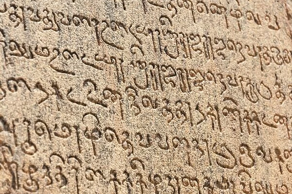 Indian inscriptions carved into a temple wall, Brihadeeswarar Temple, UNESCO World Heritage Site, Thanjavur, Tamil Nadu, India