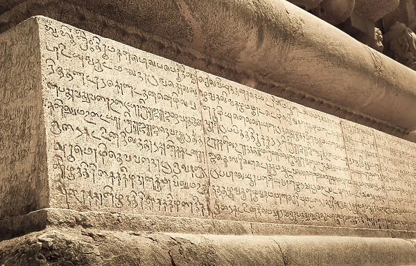 Indian inscriptions carved into a temple wall, Brihadeeswarar Temple, UNESCO World Heritage Site, Thanjavur, Tamil Nadu, India