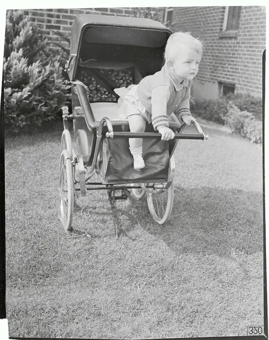 Framed Print : Infant Attempting to Leave Stroller Framed Print : Infant Attempting to Leave Stroller