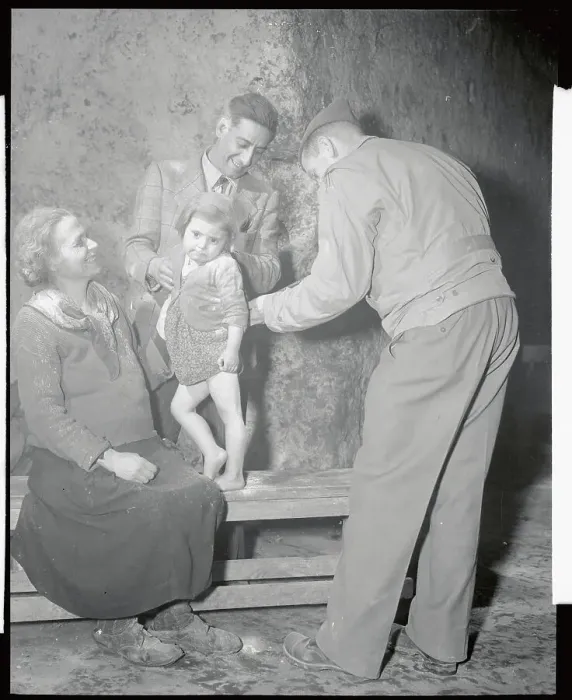 Framed Print : Infant Being Examined for Lice Framed Print : Infant Being Examined for Lice