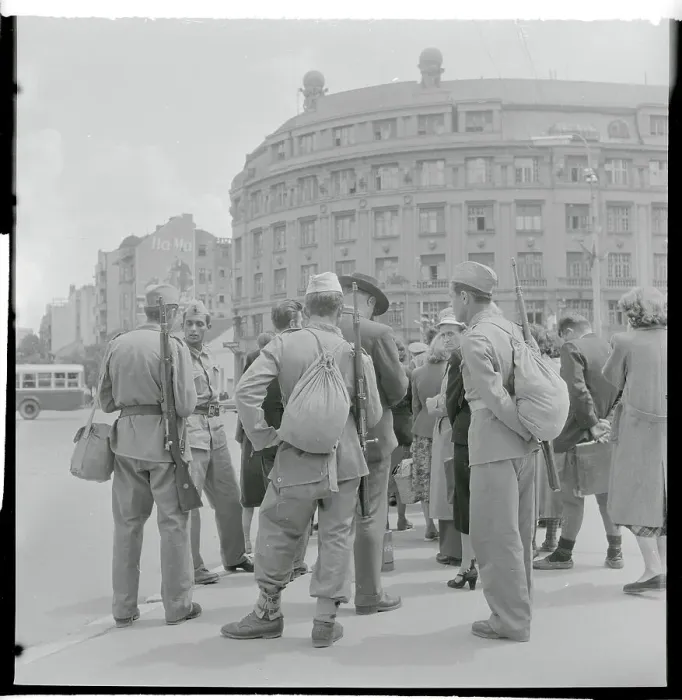 Framed Print : Infantrymen and Local Citizens Waiting at a Bus Stop Framed Print : Infantrymen and Local Citizens Waiting at a Bus Stop
