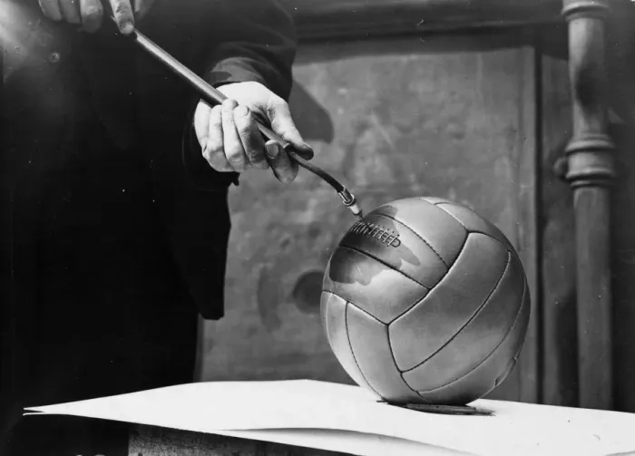 Framed Print : Inflating A Football Framed Print : Inflating A Football