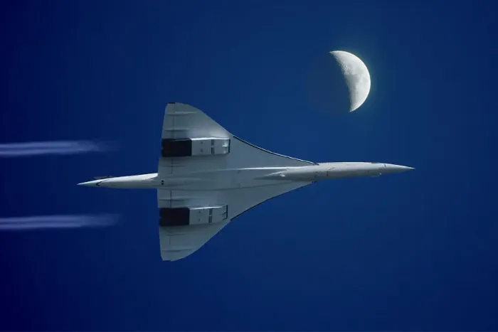 Framed Print : Inflight view of a British Aerospace Concorde SST (Supersonic Transport) with high altitude contrails and the moon Framed Print : Inflight view of a British Aerospace Concorde SST (Supersonic Transport) with high altitude contrails and the moon