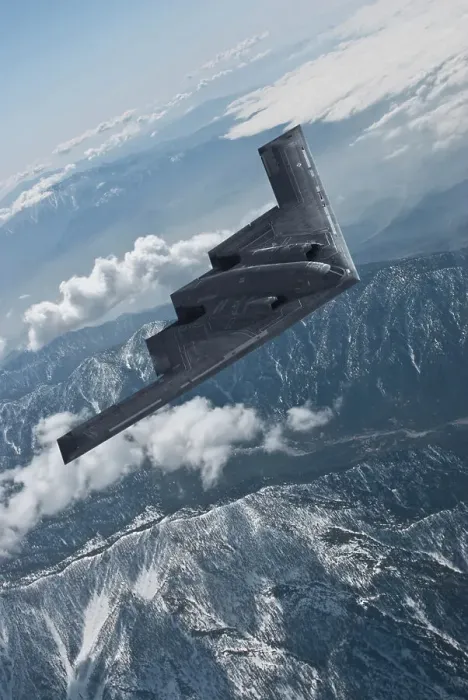 Framed Print : Inflight view of a USAF Northrop Grumman B-2A Spirit stealth bomber over mountains Framed Print : Inflight view of a USAF Northrop Grumman B-2A Spirit stealth bomber over mountains