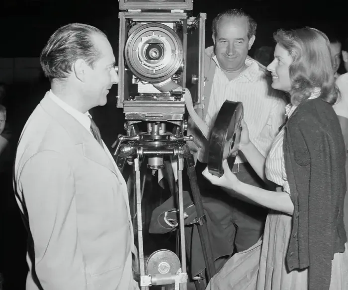 Framed Print : Ingrid Bergman Handing Reel to Roberto Rossellini Framed Print : Ingrid Bergman Handing Reel to Roberto Rossellini