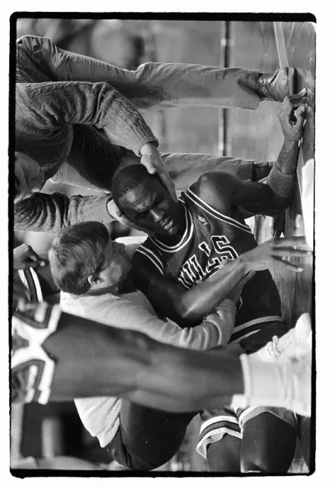 Framed Print : An Injured Michael Jordan is Looked After by Officials Framed Print : An Injured Michael Jordan is Looked After by Officials