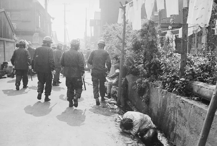 Framed Print : Injured Protester in a Roaside Ditch Framed Print : Injured Protester in a Roaside Ditch