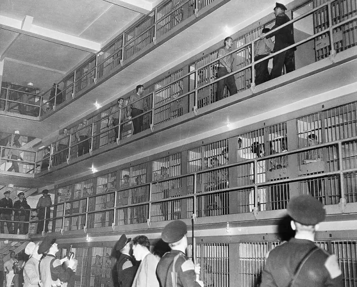 Framed Print : Inmates Being Escorted into Their Cells